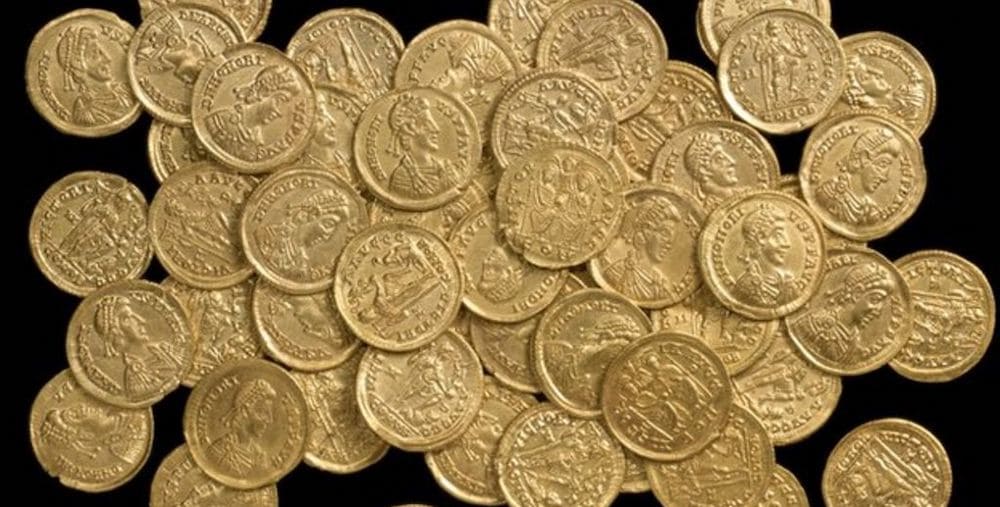 Minaría sostible monedas de ouro